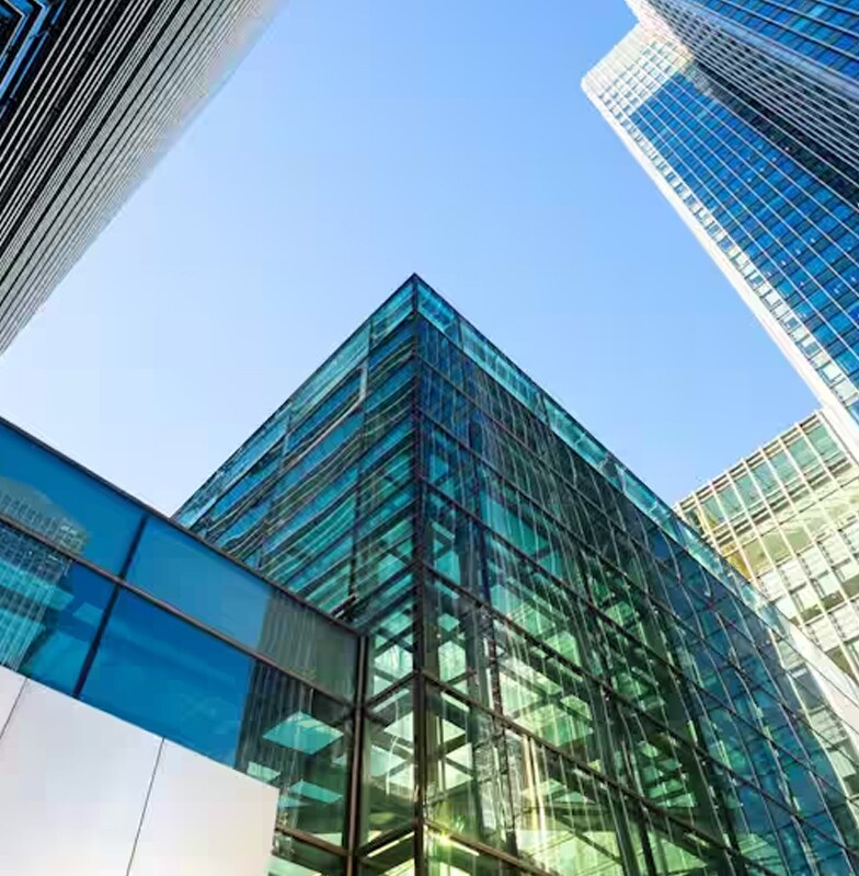Upwards shot of modern glass buildings
