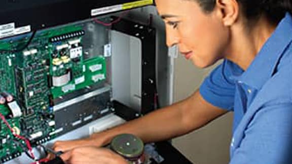 Woman setting up a network system