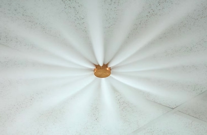 Ceiling mounted fire suppression system activated
