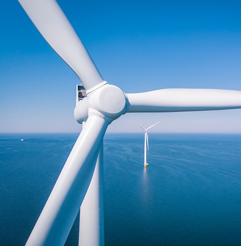 Close up of the blades of an offshore wind turbine